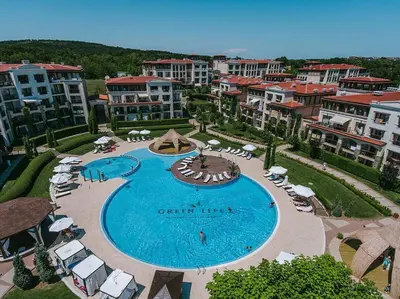 an overhead view of a swimming pool in a resort at Green life private garden studio in Sozopol