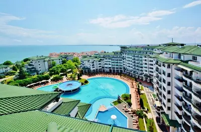 an aerial view of an apartment complex with a swimming pool at Emerald Apartman Wellness & Spa in Ravda