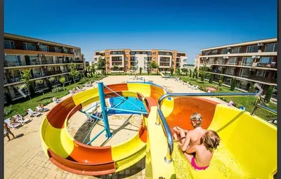 a man and a woman standing on a inflatableogie pool at Studio near the center in Sunny Beach