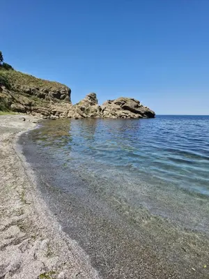 a beach with some rocks in the water at Relax in Tsarevo