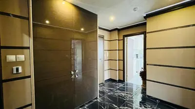 a bathroom with a walk in shower and a glass door at PARADADISO B 307 Two Bedroom Sea View Apartment in Nesebar