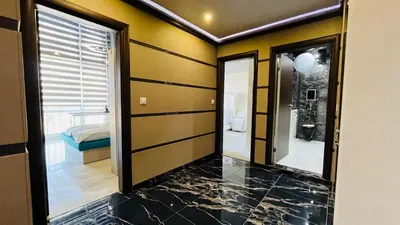 a room with a hallway with a mirror at PARADADISO B 307 Two Bedroom Sea View Apartment in Nesebar