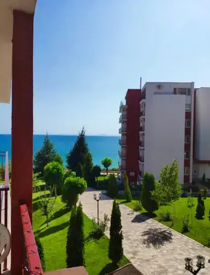 a view of a park with the ocean in the background at Two bedroom Apartment in Fort Noks Panorama beach in Elenite