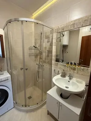 a bathroom with a shower and a sink at Boho apartament Cascadas family in Sunny Beach