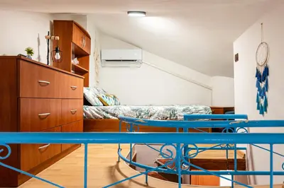 a small room with a table and a couch at Afala Loft & Terrase - Heart of Burgas in Burgas City