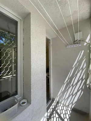 a shadow of a window on the side of a building at Уют и тишина на топ локация in Varna City