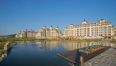 a view of a hotel with a river and buildings at Sunrise Apartment 14 in Obzor