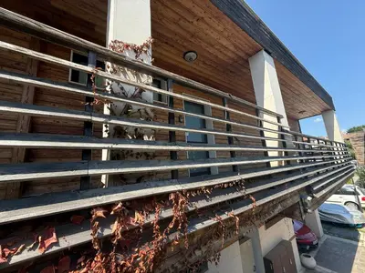 a facade of a building with wooden siding at Studio Port Nessebar in Nesebar