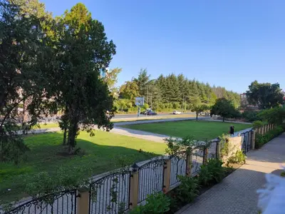 a park with a fence and a green field at Royal Sun - Vaio - 1BR Apt with Balcony in Sunny Beach