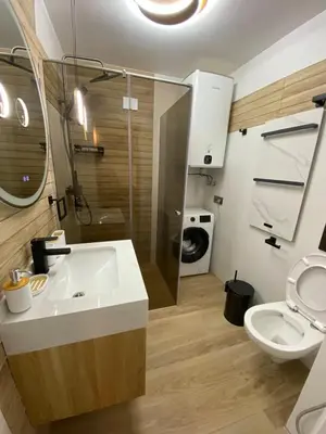 a bathroom with a sink and a shower and a toilet at Sweet Home 9 in Sunny Beach