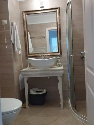 a bathroom with a sink and a mirror at Harmony 20 in Sveti Vlas