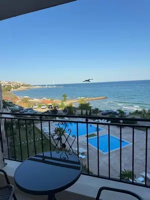 a balcony with a view of the ocean at Ипанемма с 1 спальней корпус А in Sveti Vlas