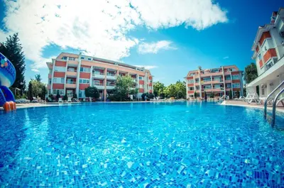 a large swimming pool in front of some buildings at Apartment in Sunny Fort in Sunny Beach