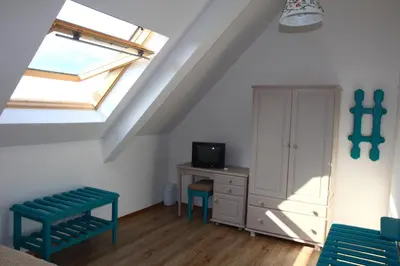 a room with a window and a cabinet and a desk at Villa Elmar in Kiten