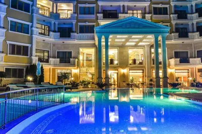 a large swimming pool in front of a building at 2-Bedroom Apartment in Villa Florence Boutique ApartHotel in Sveti Vlas