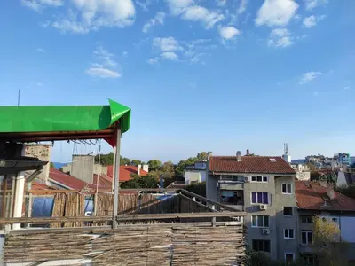 a building under construction with a green roof at KoLoNi Bright & Cosy LOFT in Varna City