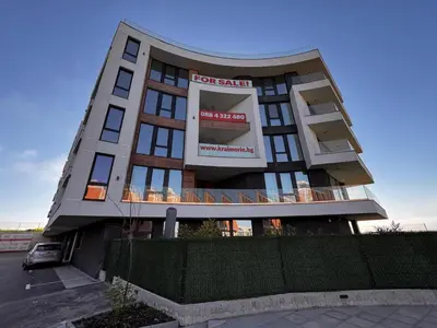 a building with a sign in front of it at Apartment Victoria in Kraymorie