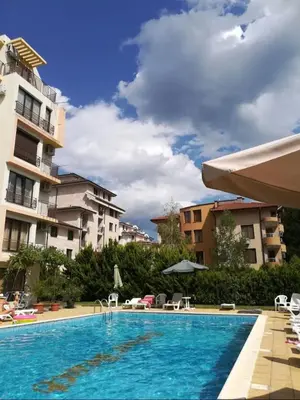 a swimming pool in the middle of a building at Amber Beach in Sunny Beach