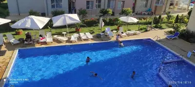 a group of people in a large swimming pool at Amber Beach in Sunny Beach