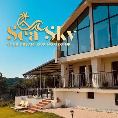 a building with a sign on top of it at Sea Sky House in Varna City