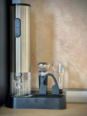 a food processor and two glasses on a table at SeaSky SmartHome-Penthouse with private Parking in Burgas City