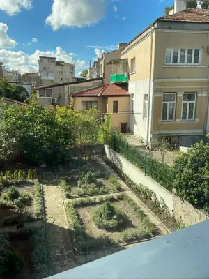 a garden in the middle of a city at Nearby the Sea- Elegant Retreat in Varna in Varna City