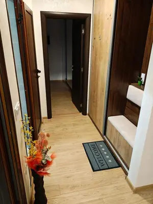 a hallway with a door leading to a room at Trend Apart in Burgas City