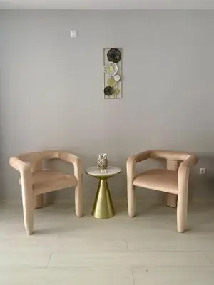 two chairs and a table in a room at J'Adore Secret Garden, Deluxe Apartment in Sunny Beach