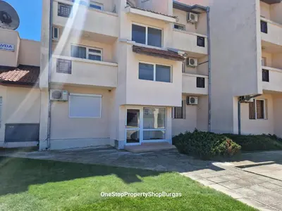 an apartment building with the front door open at Ravda Holiday Village 1-bed seaview apartment in Ravda