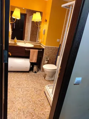 a bathroom with a tub and a toilet and a sink at Studio Royal Beach Barcello in Sunny Beach