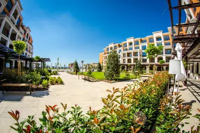 a street in a city with buildings and plants at Premier Fort Club Hotel - Full Board in Sunny Beach