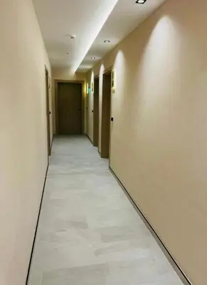 a corridor of a hallway with a long hallway at Sorrento Sole Mare Sveti Vlas in Sveti Vlas