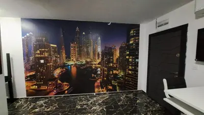 a bathroom with a mural of a city at Luxe 1 Dubai Penthouse in Obzor