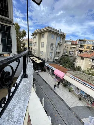 a view from a balcony of a city with buildings at Velaria Centre Apartment in Burgas City