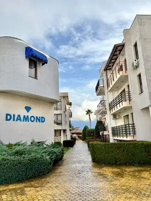 a sign on the side of a building at Sveti Vlas Marina Beach Apartment - Diamond Apart Complex in Sveti Vlas