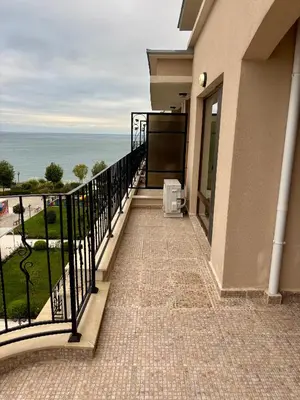 a balcony with a view of the ocean at Luxury in Sveti Vlas