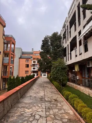 an empty street in a city with buildings at Studio Sea Breeze Sveti Vlas ap58 in Sveti Vlas