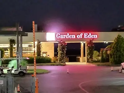 a garden of eden sign in front of a gas station at Garden of Eden - Panorama C15 Rey&Mar in Sveti Vlas