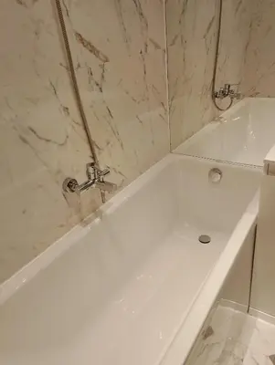 a white bath tub in a bathroom with a sink at Garden of Eden - Panorama C15 Rey&Mar in Sveti Vlas