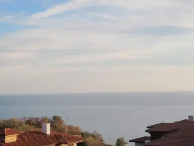 a view of the ocean from the roofs of houses at Garden of Eden - Panorama C15 Rey&Mar in Sveti Vlas