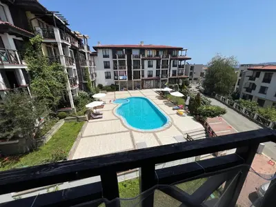 a view of a pool from a balcony of a building at Camping Gradina Sunny Bay Appartment in Chernomorets