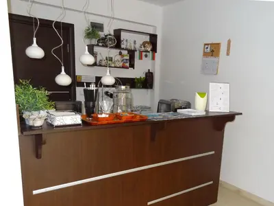 a kitchen with a counter with food on it at Family нouse -Нotel Asai in Ravda