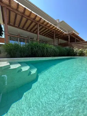 a swimming pool in front of a house at Lozenets Luxury Pool Villa by Lozenetsvillas in Lozenets