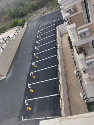 an overhead view of a parking lot with yellow taxis at Emperium, Style, Coziness and tranquility by the sea in Sveti Vlas! in Sveti Vlas