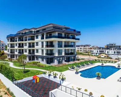 an image of a large apartment building with a swimming pool at Valena Royal apartment in Chernomorets