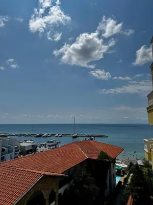 a view of a harbor with boats in the water at Marina Sunrise Complex by the sea in Sveti Vlas