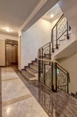 a staircase in a house with a stair railing at Central Luxury One Bedroom in Varna in Varna City