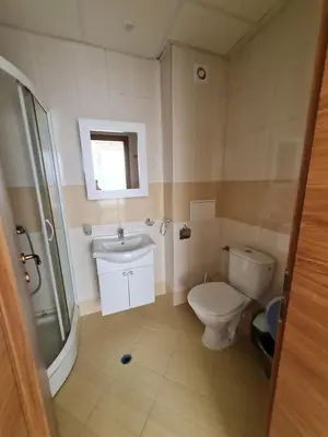 a bathroom with a toilet and a sink and a shower at Studio in a Resort with 9 pools in Sunny Beach