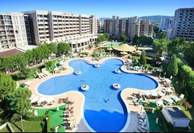 an aerial view of a resort with a swimming pool at ROYAL BEACH HOTEL apartment SEA G in Sunny Beach