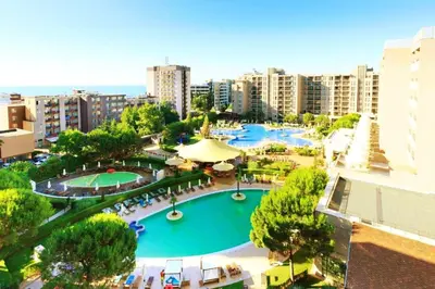 an overhead view of a large swimming pool in a city at ROYAL BEACH HOTEL apartment SEA G in Sunny Beach